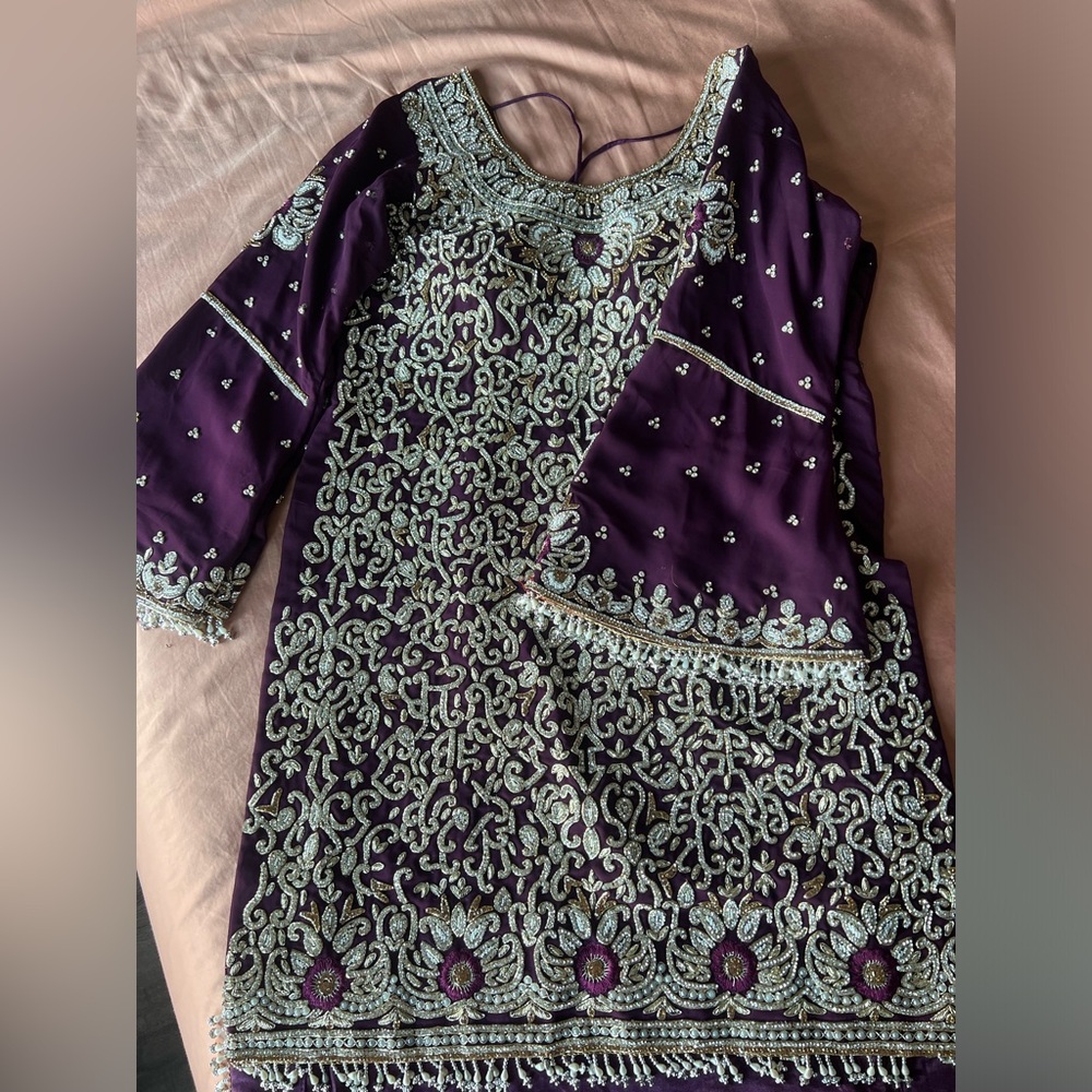 Indian high and low dress filled with heavy embroidery
